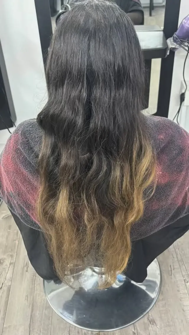 Caramel balayage melt on dark hair