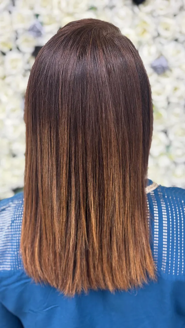 Auburn colour finished with an anti-frizz protein treatment