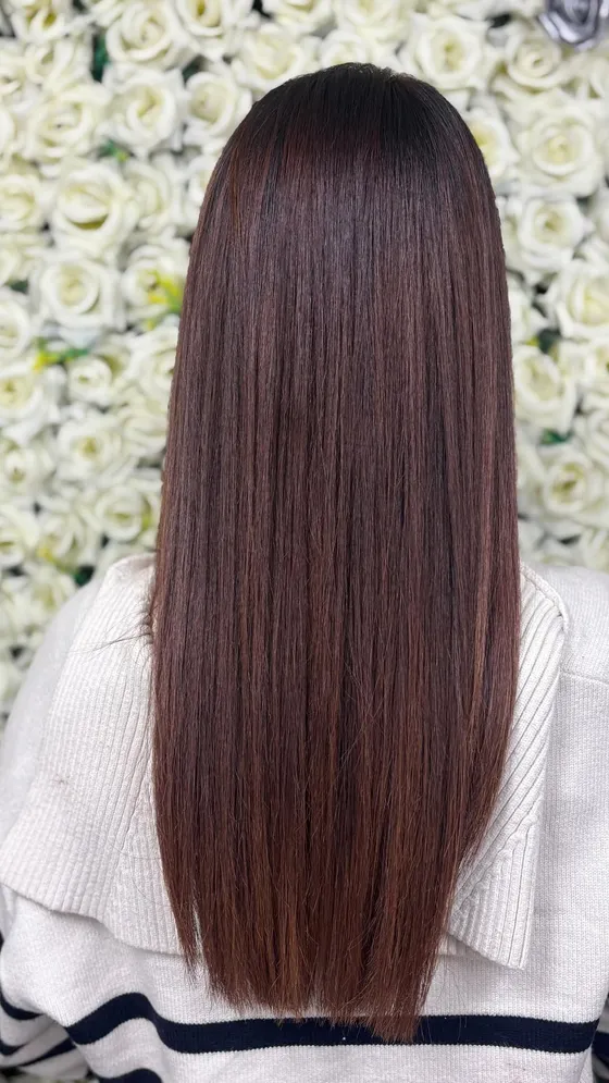 Glossy chocolate-brown full-head colour, blow-dried straight